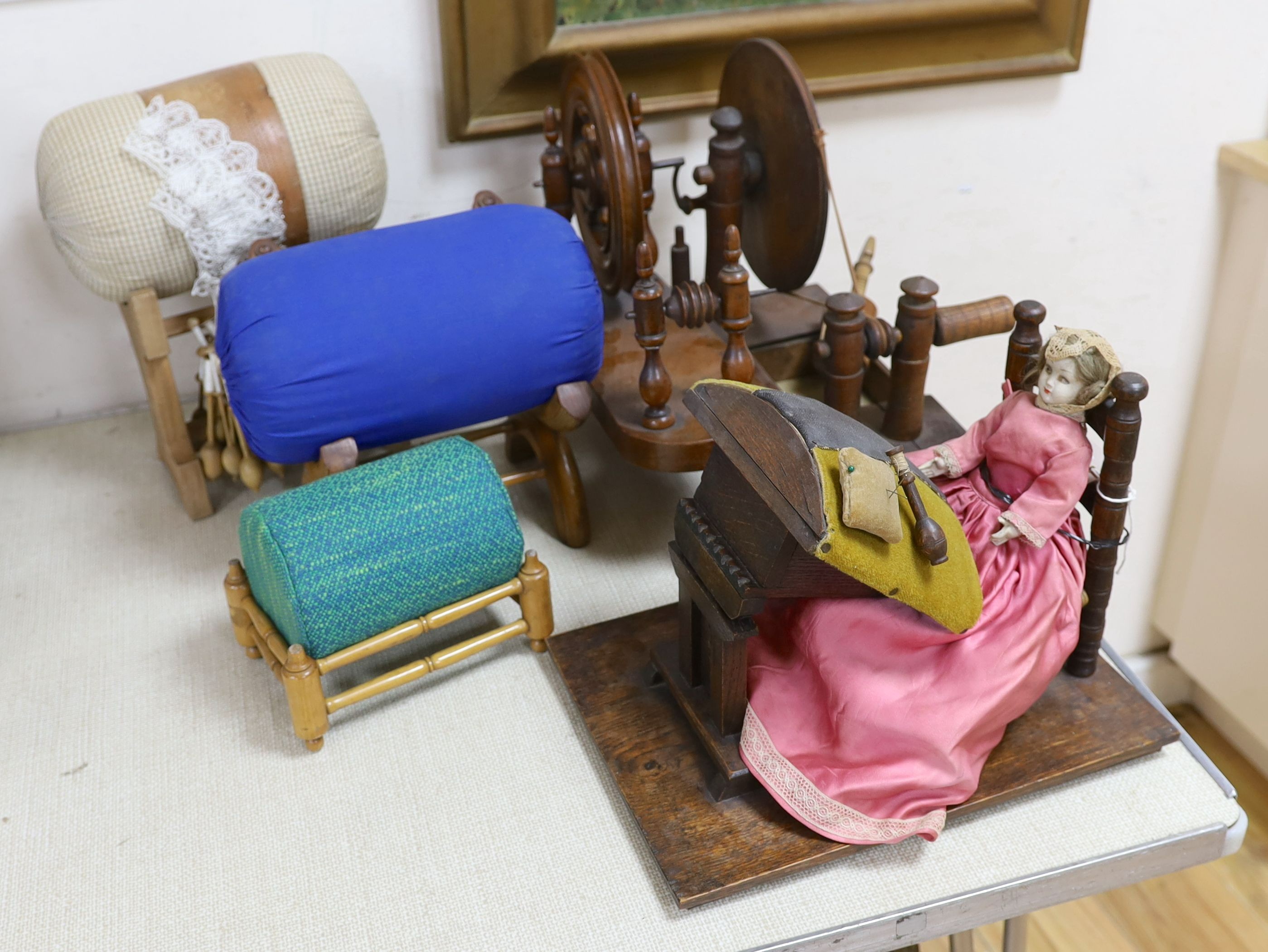 Two model lace-bobbin wheels, lace-maker’s pillows, bobbins, pillows etc